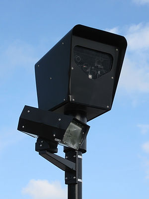 A red light camera in Chicago, USA. A red light camera in Chicago, USA.